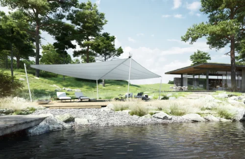 Moderner Garten mit Sonnensegel und Holzterrasse am Wasser